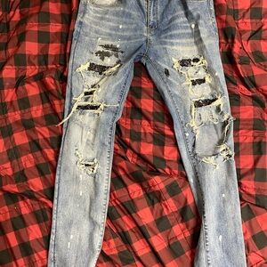 Distressed Blue Jeans
